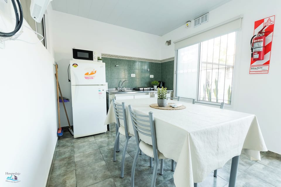 Family Room | Private kitchen | Full-size fridge, microwave, stovetop, cookware/dishes/utensils