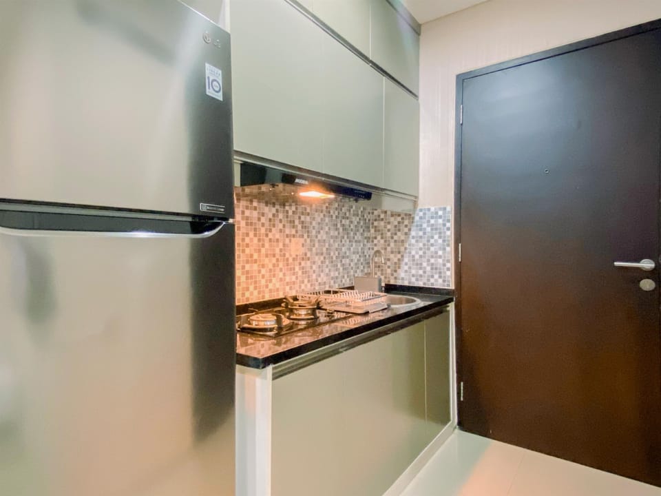 Apartment | Private kitchen | Fridge, stovetop, rice cooker, dining tables