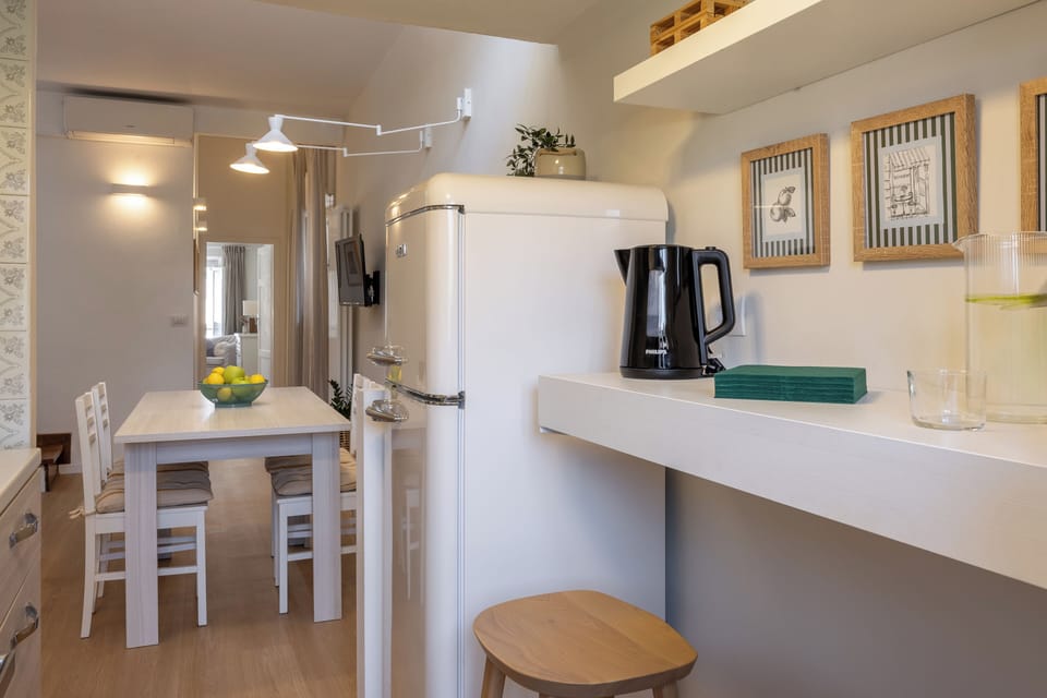 Apartment, City View | Private kitchen | Full-size fridge, microwave, oven, espresso maker