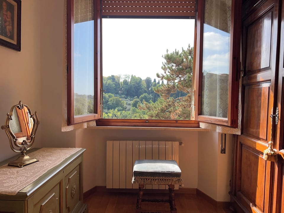 2 bedrooms, blackout drapes, soundproofing, iron/ironing board