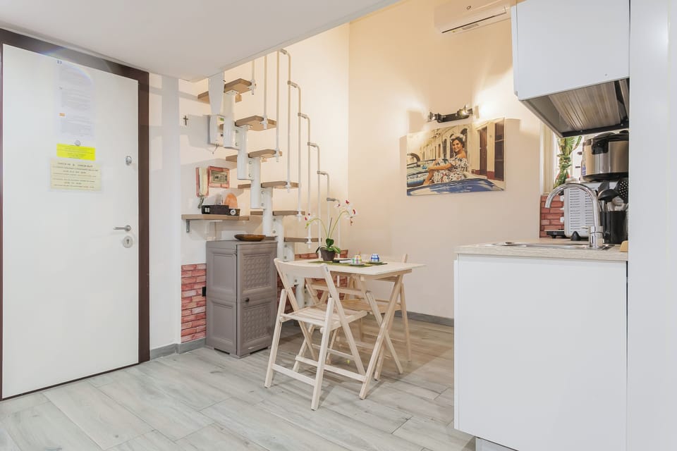 Apartment | Private kitchen | Electric kettle, dining tables
