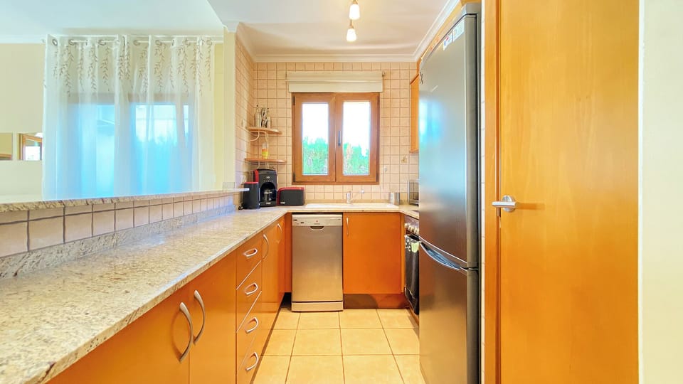 Villa | Private kitchen | Fridge, microwave, oven, stovetop