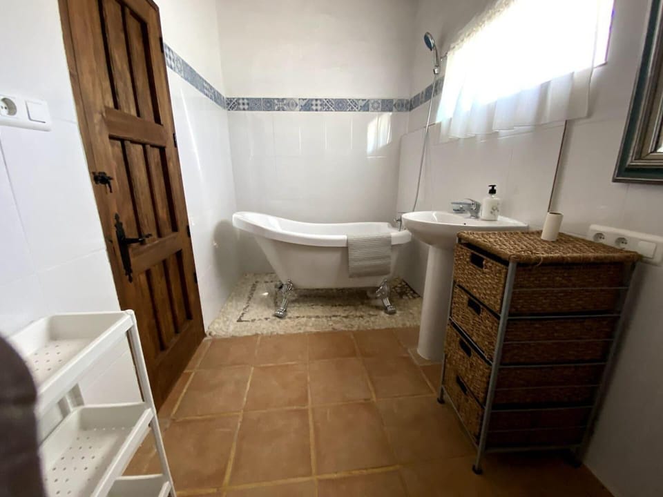 Cabin | Bathroom | Combined shower/tub, deep soaking tub, hair dryer, towels
