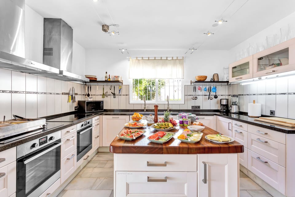 Villa | Private kitchen | Fridge, microwave, oven, stovetop