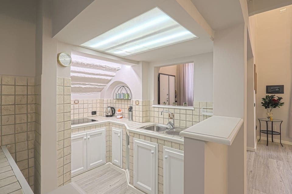 Apartment | Private kitchen | Full-size fridge, microwave, stovetop, espresso maker