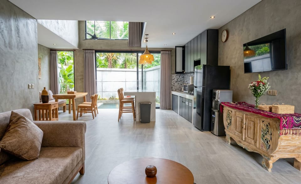 Villa | Living area | 25-inch TV with satellite channels