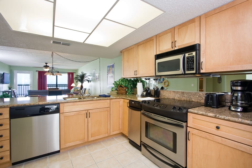 Condo, 1 Bedroom, Balcony, Beach View (#1, Saida Tower III) | Private kitchen | Full-size fridge, microwave, stovetop, dishwasher