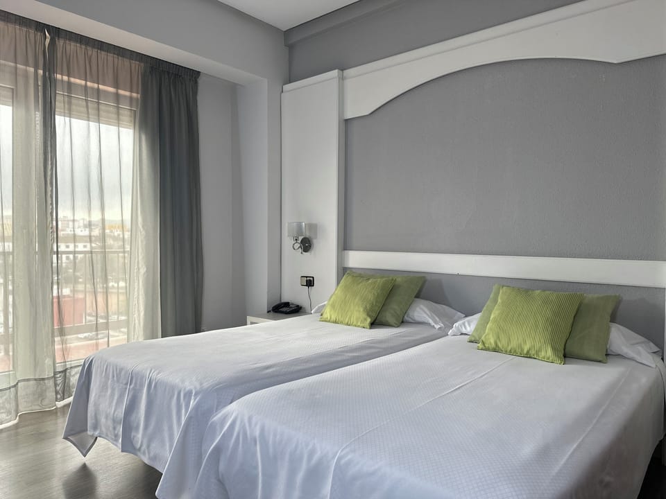 Double or Twin Room, Balcony | In-room safe, desk, blackout drapes, soundproofing