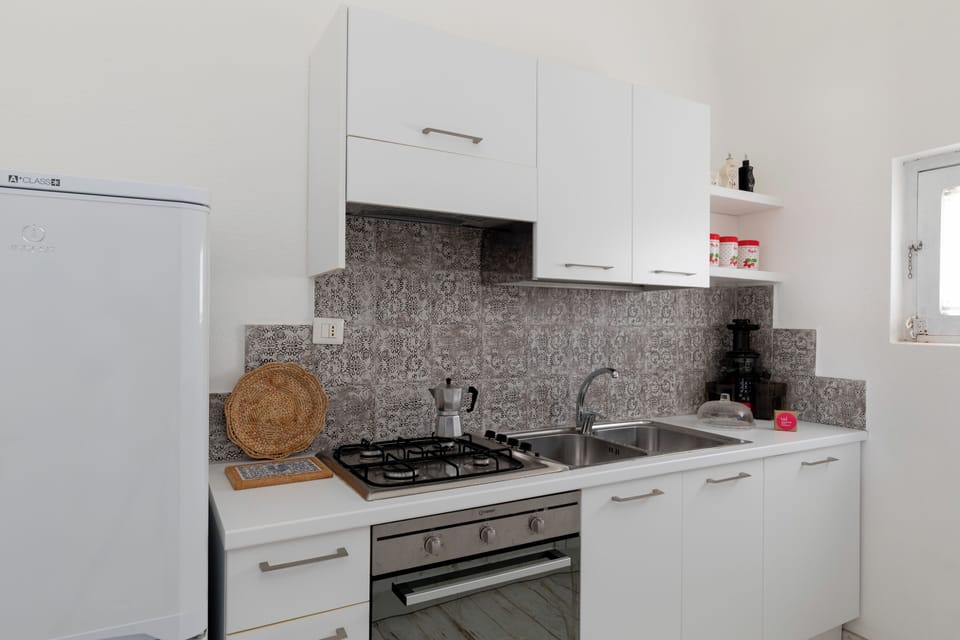 Apartment, Sea View | Private kitchen | Espresso maker