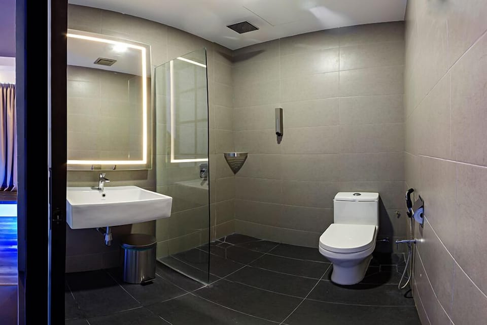 Shower, rainfall showerhead, hair dryer, towels