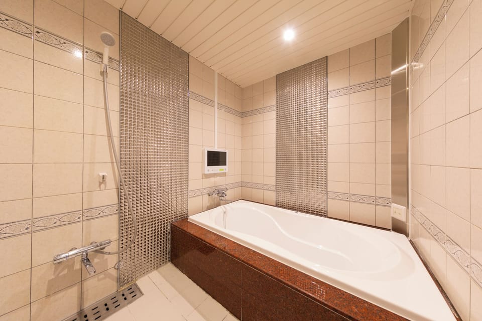 Standard Room | Bathroom | Free toiletries, hair dryer, bathrobes, slippers