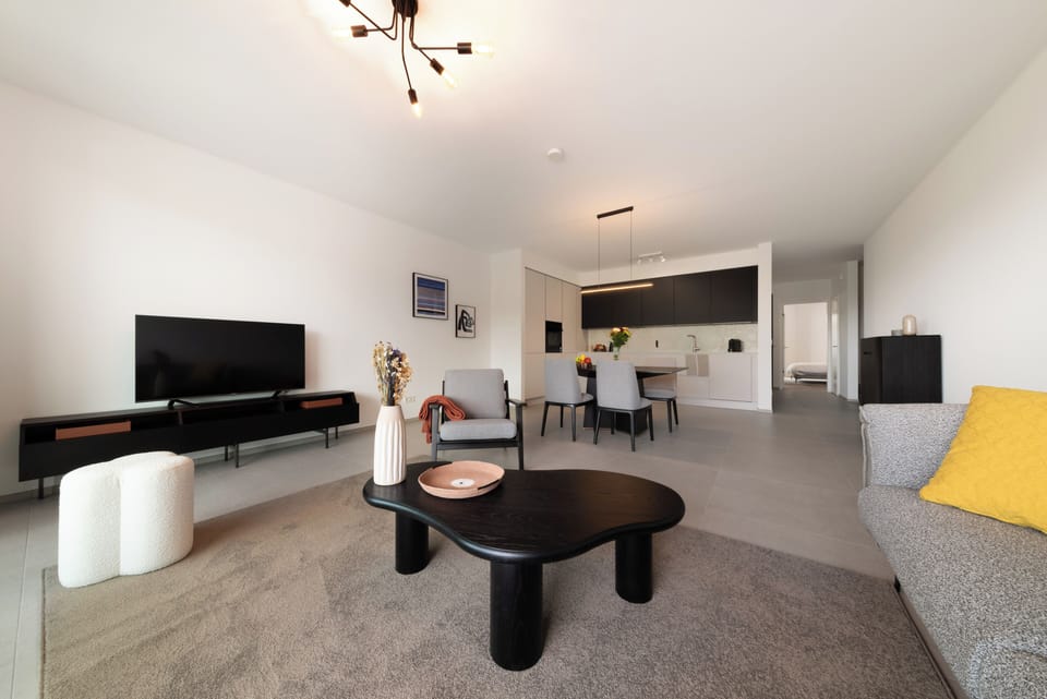 Comfort Apartment | Living area | Flat-screen TV, heated floors