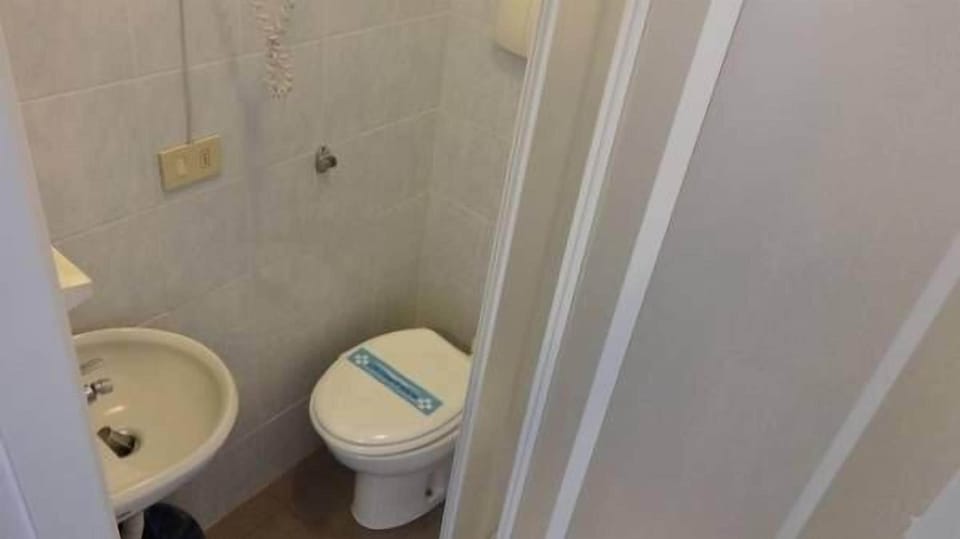 Shower, free toiletries, hair dryer, slippers
