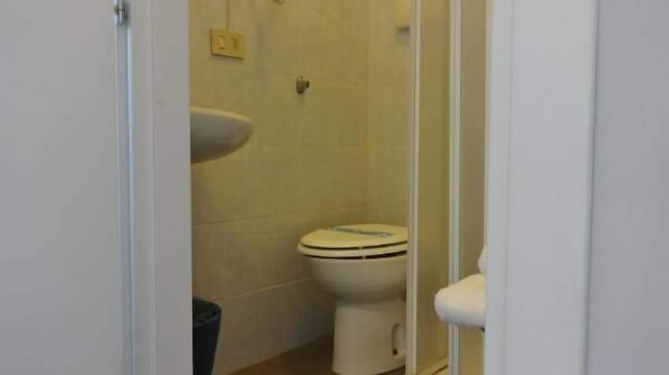 Shower, free toiletries, hair dryer, slippers