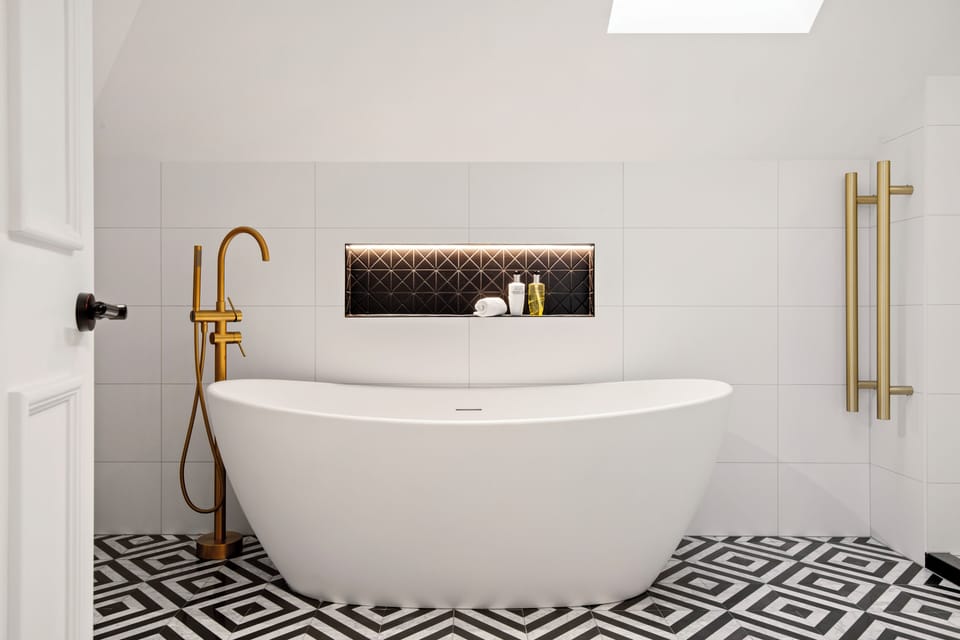Clements Suite | Bathroom | Shower, hair dryer, bathrobes, slippers