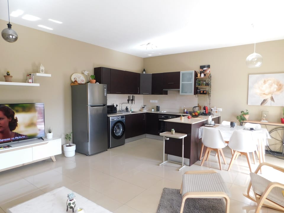 Comfort Apartment, Pool View | Private kitchen | Espresso maker, full-size fridge, microwave, oven