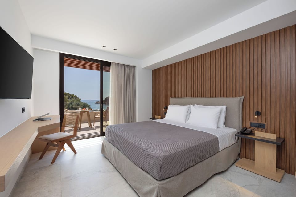Standard Room, Balcony, Sea View | 1 bedroom, in-room safe, desk, blackout drapes