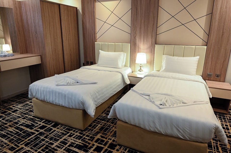 Double or Twin Room, Multiple Beds | Laptop workspace, blackout drapes, soundproofing, iron/ironing board