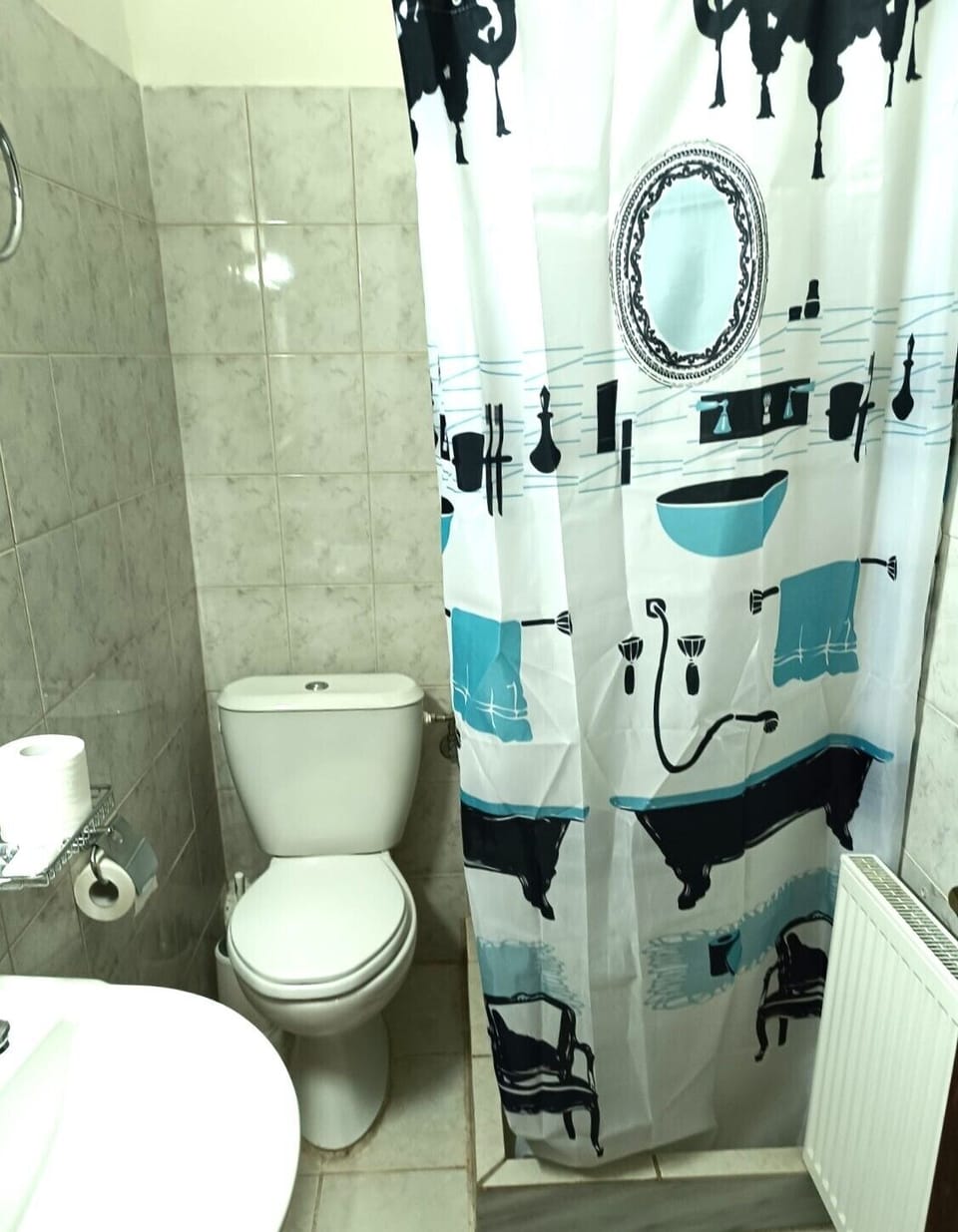 Shower, designer toiletries, hair dryer, towels