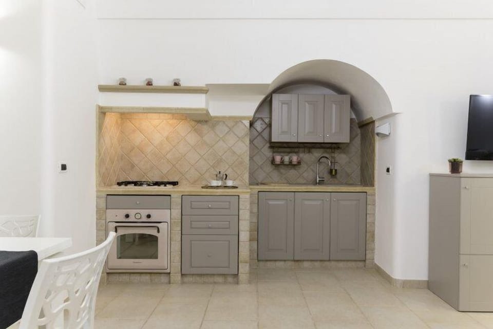 Apartment, City View | Private kitchen | Highchair