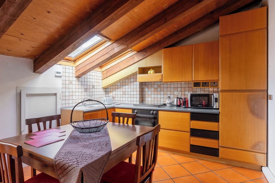 Apartment | Private kitchen | Electric kettle, dining tables
