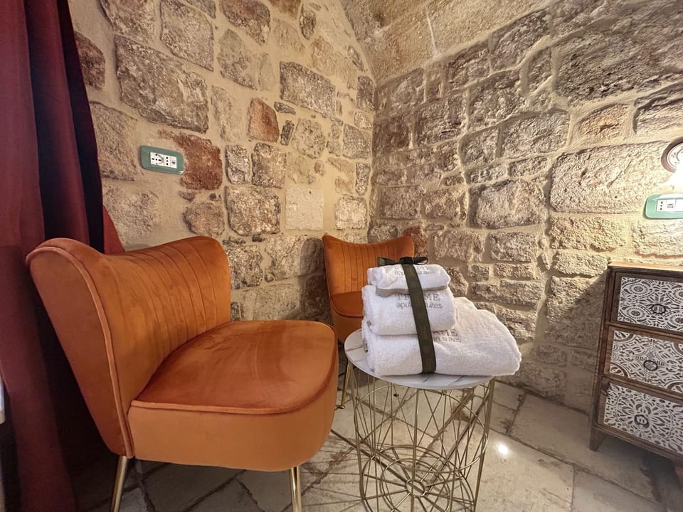 Deluxe Double Room, Ground Floor | Minibar (some free items), soundproofing, WiFi (free), bed sheets