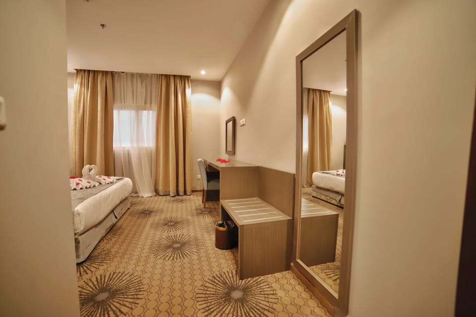 Premium bedding, blackout drapes, WiFi (free), bed sheets