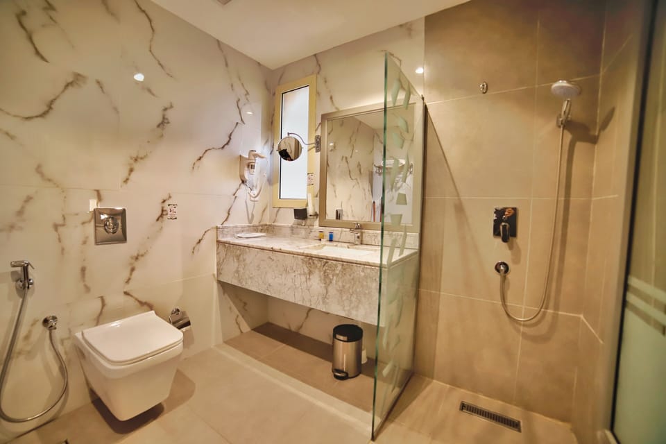 Standard Room, City View | Bathroom | Shower, rainfall showerhead, slippers, bidet
