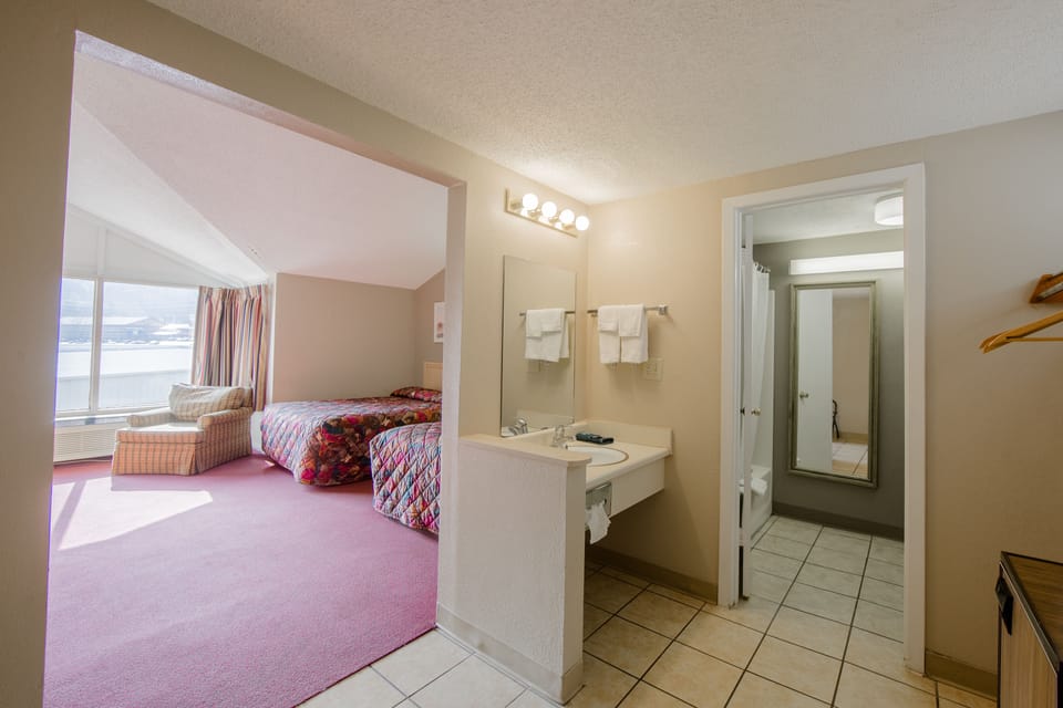 Deluxe Double Room | Desk, blackout drapes, iron/ironing board, free WiFi