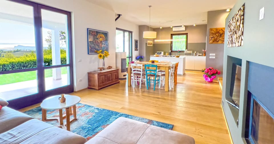 Superior Villa, Lake View | Living area | 50-inch flat-screen TV with digital channels