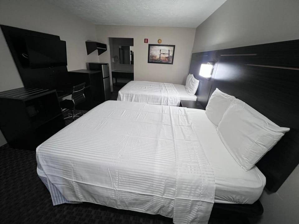 Standard Double Room | Desk, laptop workspace, blackout drapes, iron/ironing board