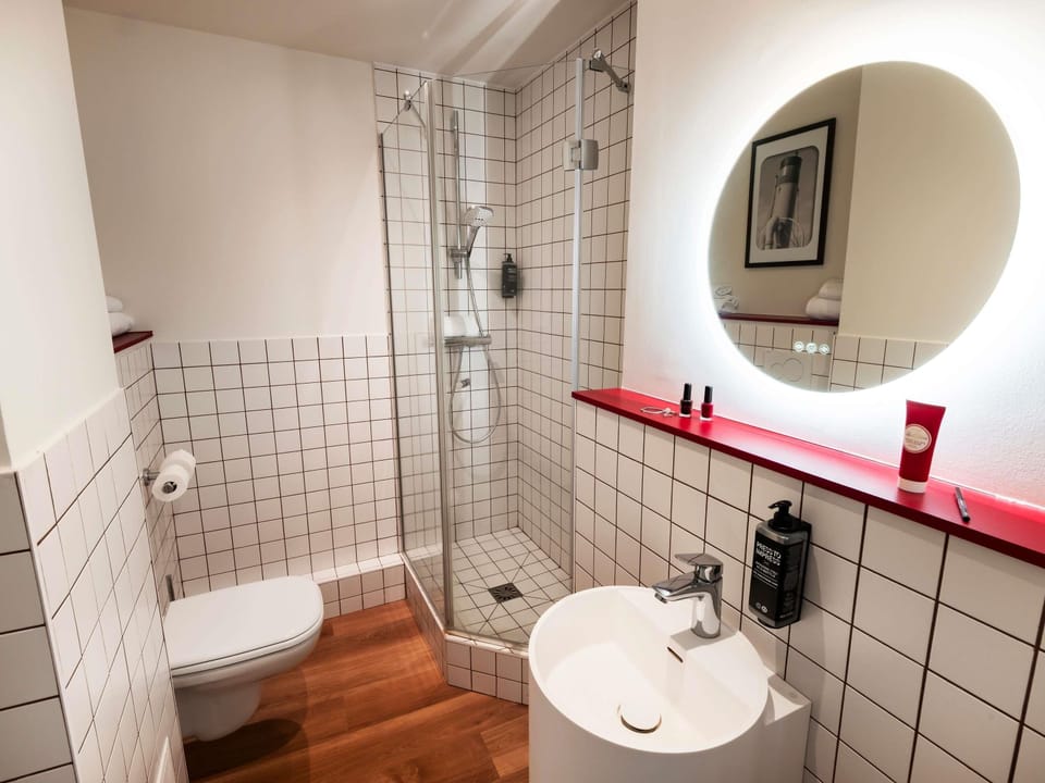 Eco-friendly toiletries, hair dryer, towels