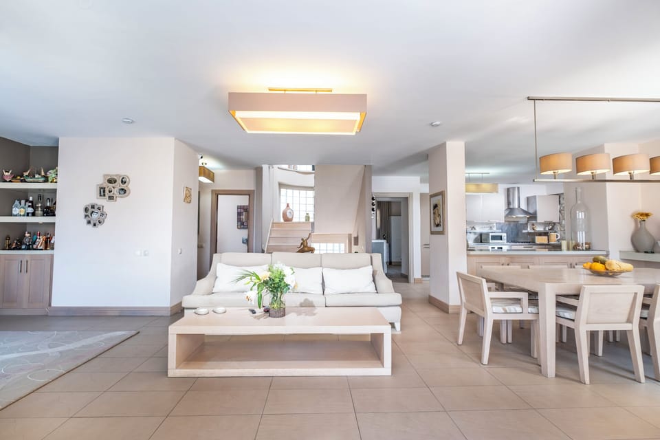 Deluxe Suite | Living area | Fireplace, heated floors