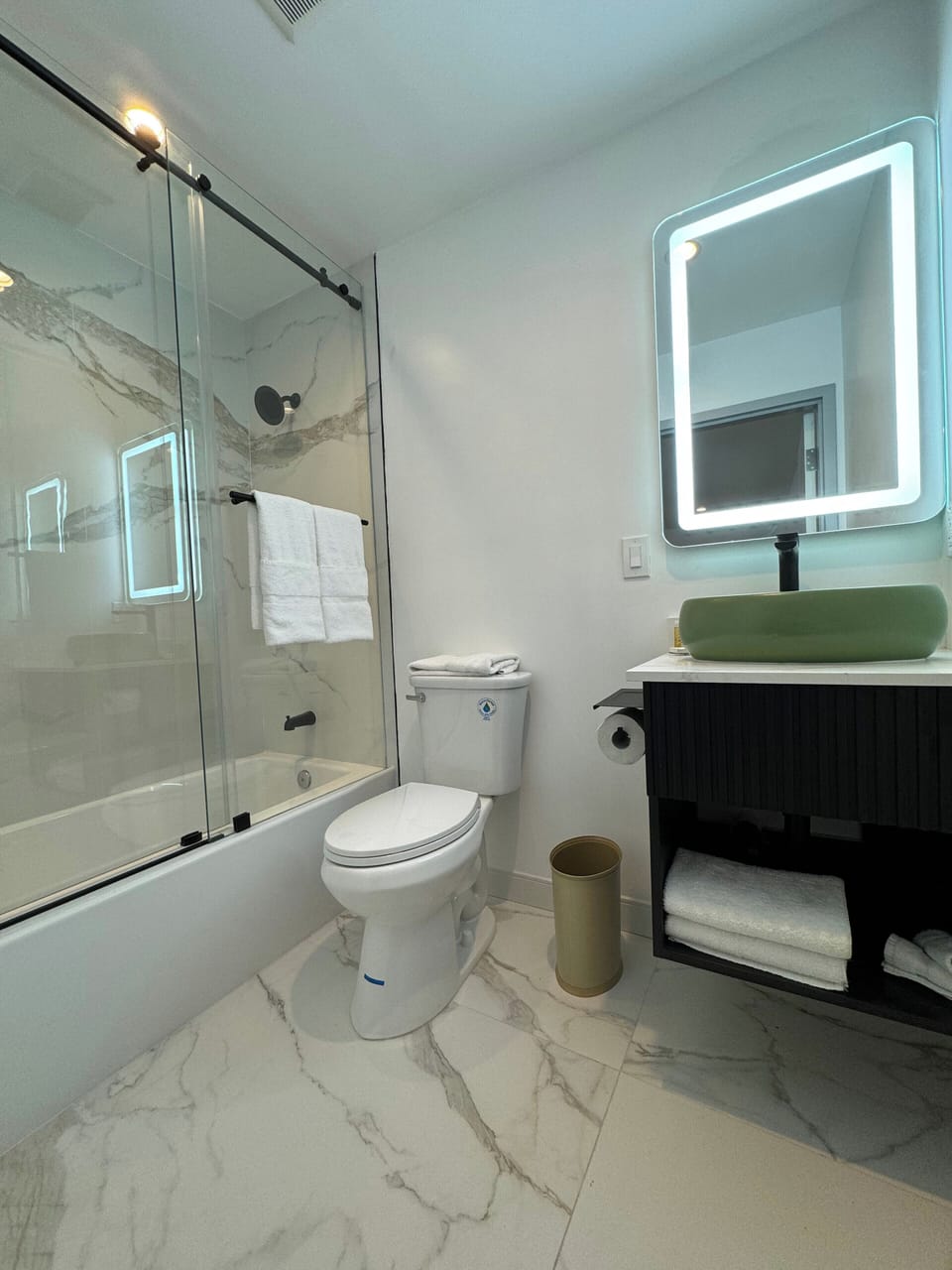 Bathtub, hair dryer, towels, soap