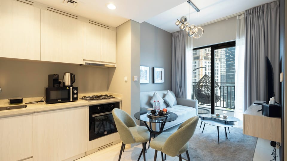 Deluxe Apartment, 1 Bedroom, Lake View | Living area | 50-inch Smart TV with digital channels