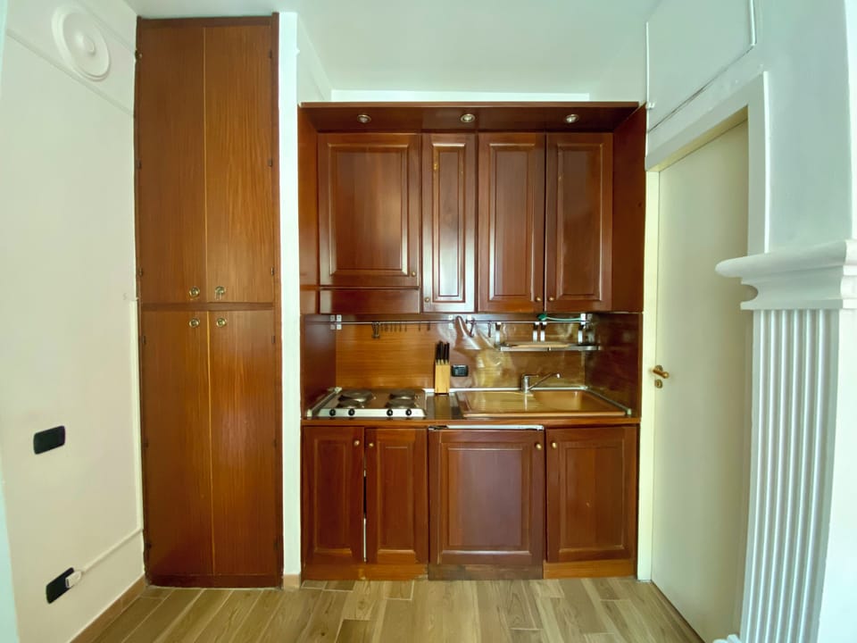 Stovetop, toaster, dining table