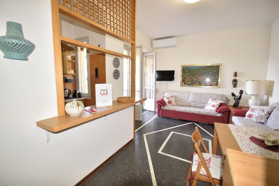 Apartment, Sea View | Living area | 30-inch flat-screen TV with digital channels