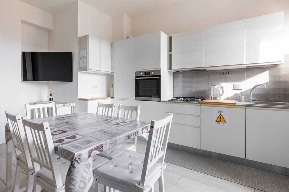 Apartment, Balcony | Private kitchen | Fridge, oven, stovetop, coffee/tea maker