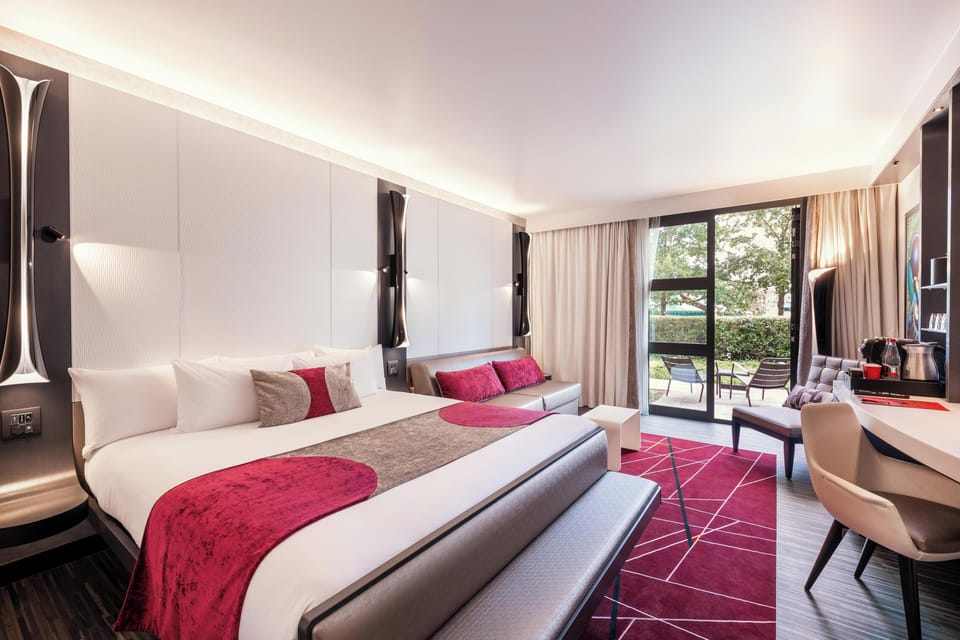 Superior Room with Garden Terrace | Premium bedding, in-room safe, desk, laptop workspace