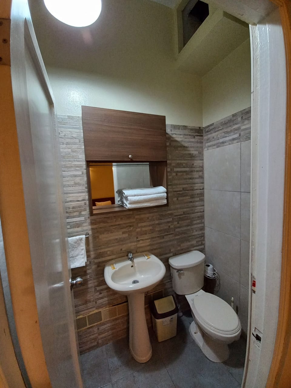 Shower, rainfall showerhead, towels, soap