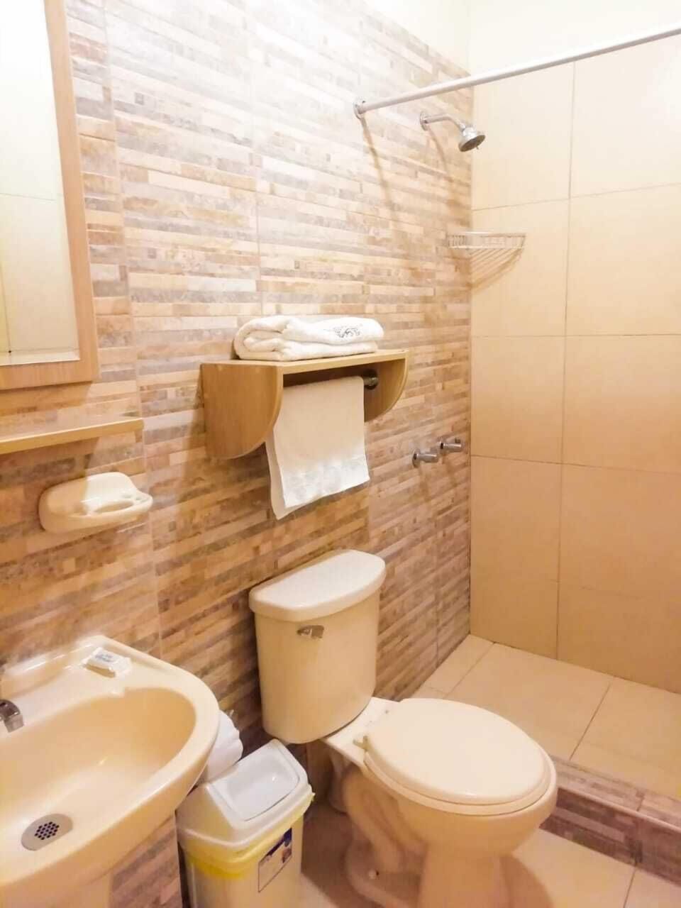 Economy Single Room, 1 Double Bed, Non Smoking | Bathroom | Shower, rainfall showerhead, towels, soap
