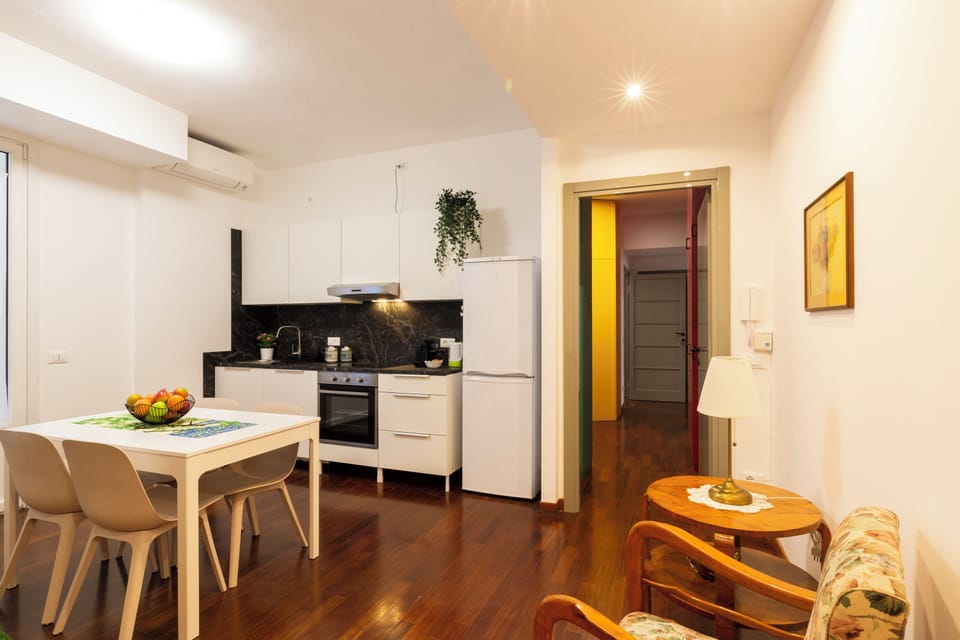 Comfort Apartment | Living area | 32-inch flat-screen TV with digital channels