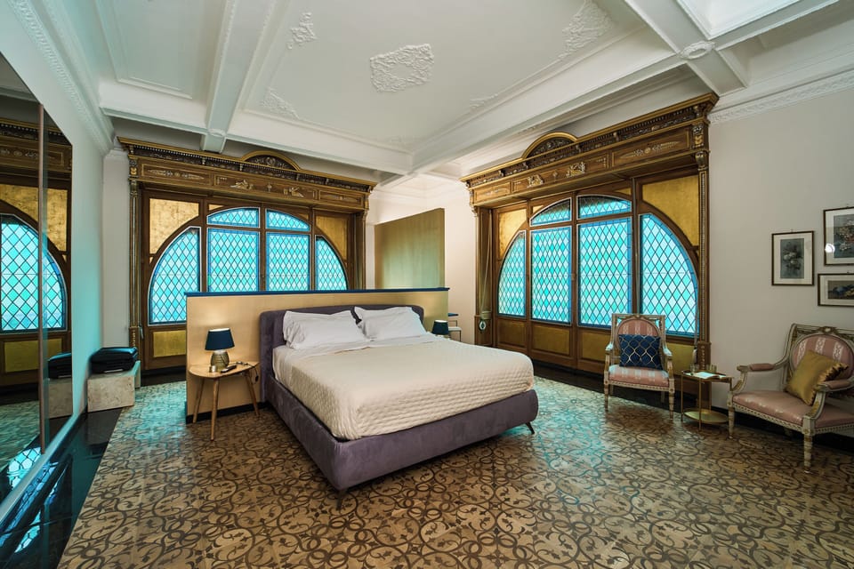 Luxury Suite, Balcony, City View | In-room safe, desk, laptop workspace, blackout drapes