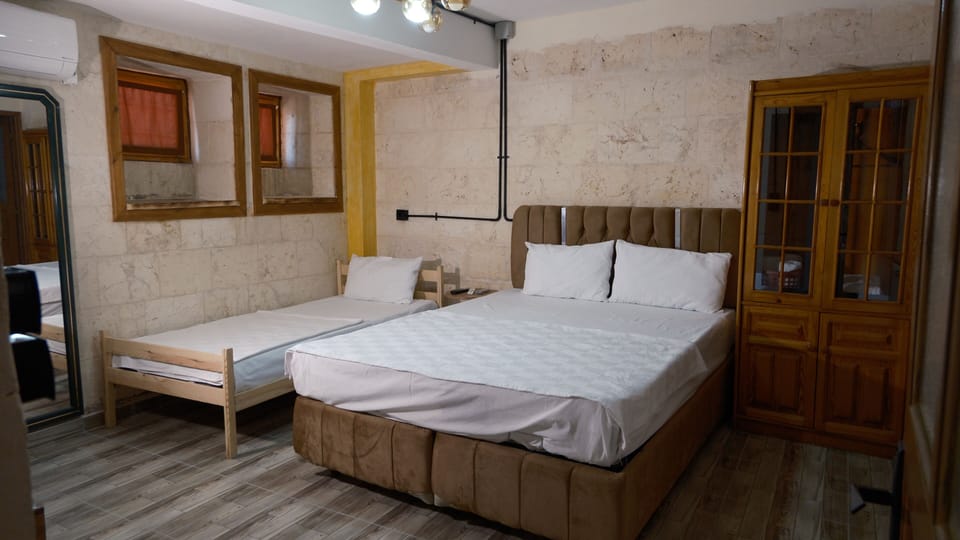 Family Room, 1 Bedroom | Minibar, iron/ironing board, free WiFi
