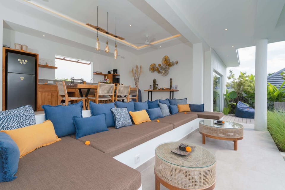Basic Villa | Living area | 32-inch Smart TV with digital channels, streaming services