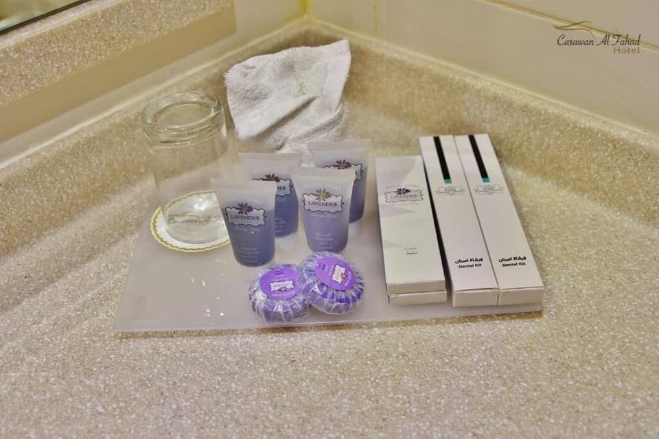 Hair dryer, slippers, towels, soap