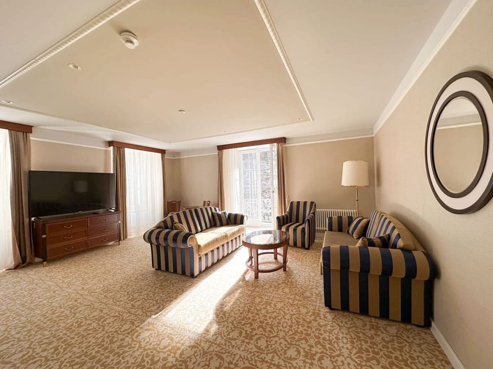 Family Suite, Balcony, Park View | Living area | 43-inch Smart TV with premium channels