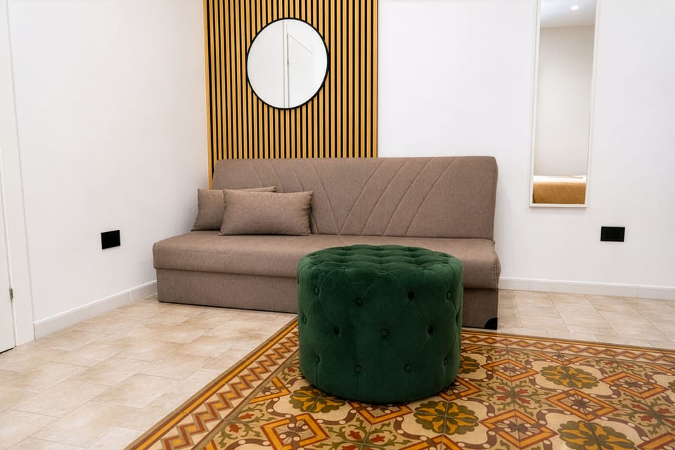 Deluxe Quadruple Room | Memory foam beds, minibar, desk, laptop workspace