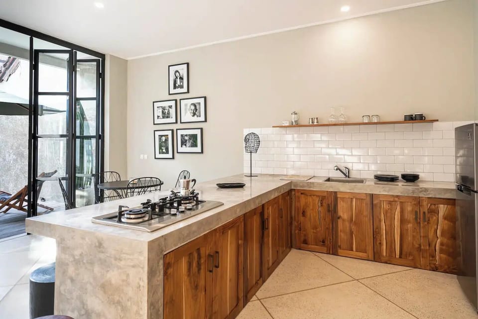 Luxury Villa | Private kitchen | Cookware/dishes/utensils, dining tables, kitchen islands