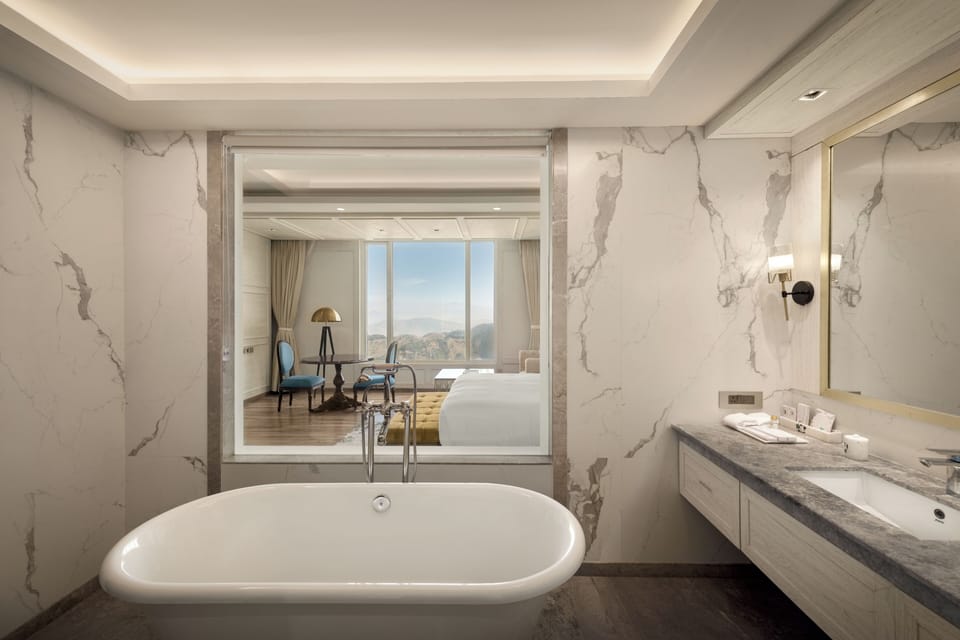 Signature Suite, 1 King Bed, Bathtub, Slope side | Bathroom | Shower, hair dryer, towels, soap